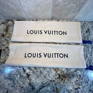 Authentic Louis Vuitton dust bags.